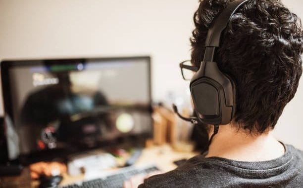 image2 man playing video game